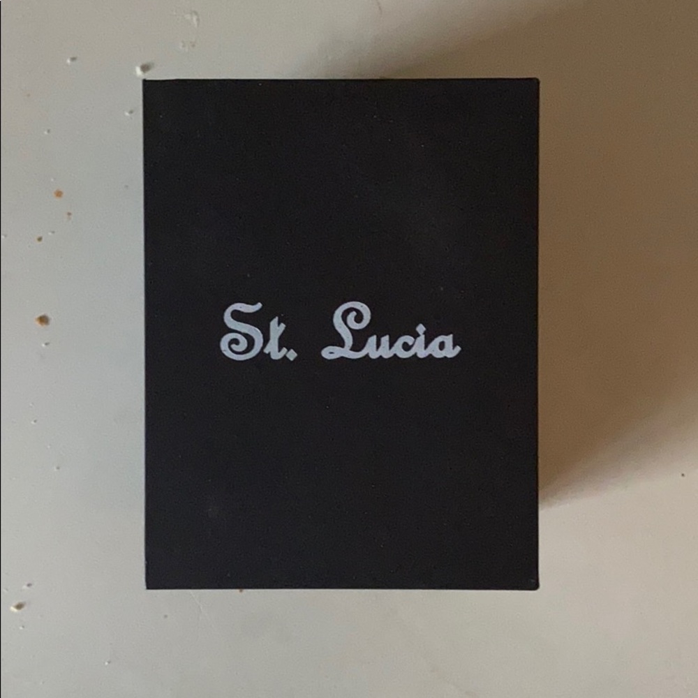 A brand new rose gold watch in the box